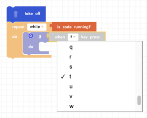 Blockly Junior forever loop with t key selected from dropdown menu