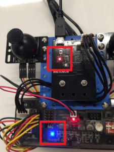 CoDrone Pro remote control with blue and red LEDs
